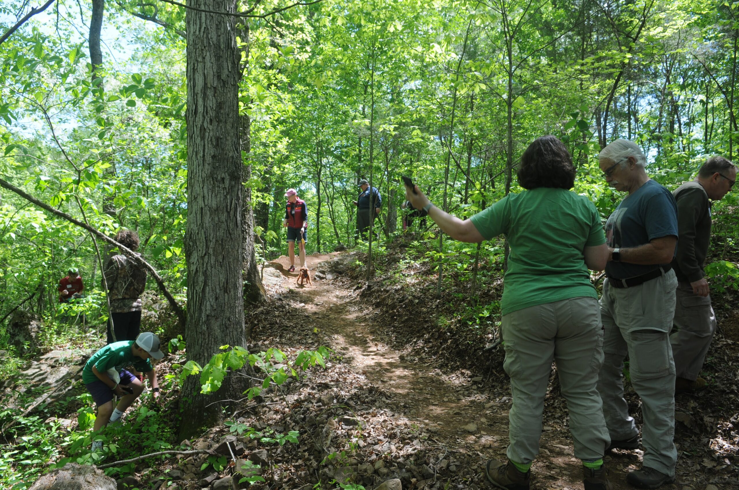 Geocachers from the event are on the trail looking for caches.