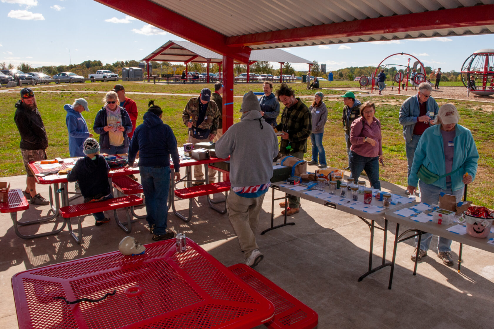 2SAVE 023 Fall Picnic 3 Members check out the many auction items during the 2023 fall picnic.